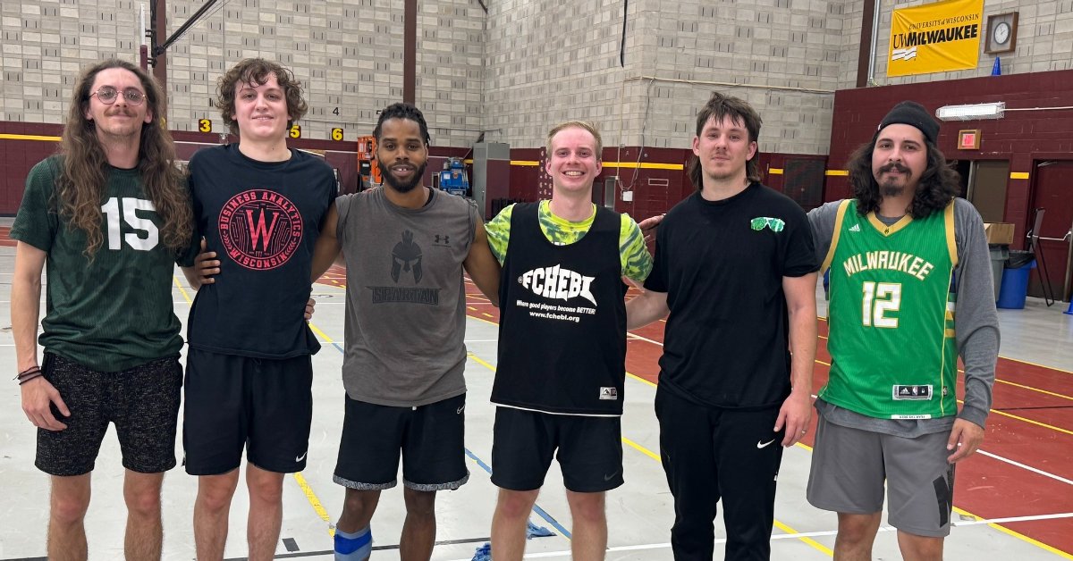 basketball players posing for a picture